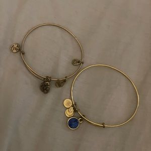 Alex and Ani hold bracelet bundle